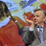 Michael Gove applauding at conference